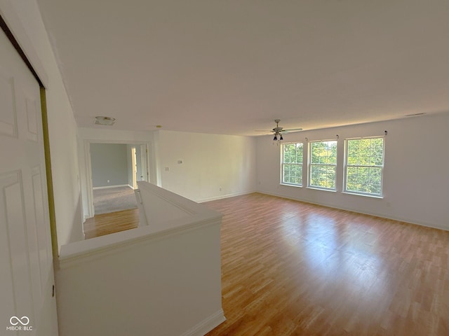 3724 Jonathan Rdg, Columbus, IN 47201 - spare room featuring light wood-type flooring and ceiling fan