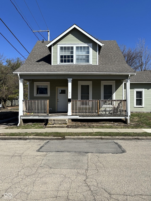 312 S Gharkey St, Muncie, IN 47305 - bungalow-style house with roof with shingles and covered porch
