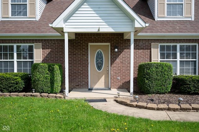 4786 N Mill Ct, Greenfield, IN 46140 - doorway to property with brick siding and a shingled roof