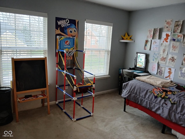 5983 Clearview Dr, Carmel, IN 46033 - bedroom featuring baseboards, multiple windows, and carpet