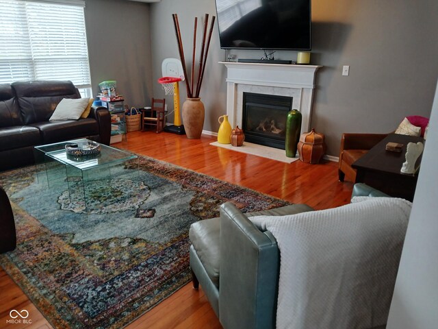 5983 Clearview Dr, Carmel, IN 46033 - living area featuring wood finished floors and a fireplace