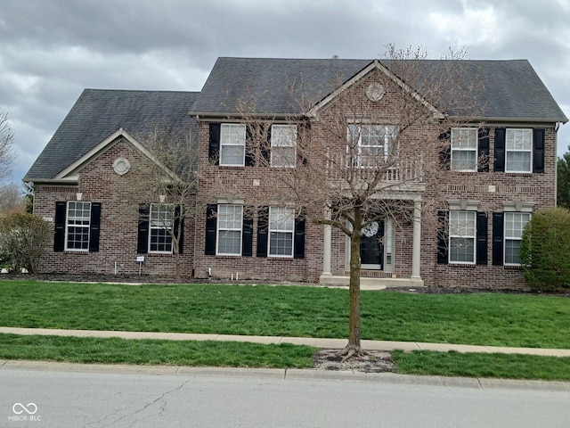 5983 Clearview Dr, Carmel, IN 46033 - view of front of house featuring a front lawn and brick siding