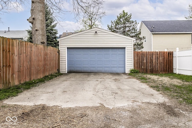 detached garage with fence