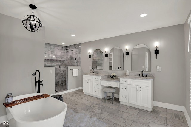 full bath with baseboards, marble finish floor, tiled shower, and a sink