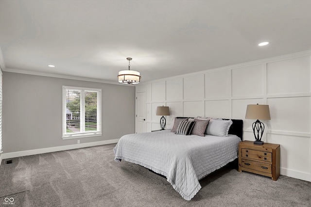 carpeted bedroom featuring visible vents, baseboards, recessed lighting, and crown molding