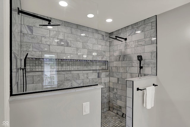 full bathroom featuring recessed lighting and a walk in shower