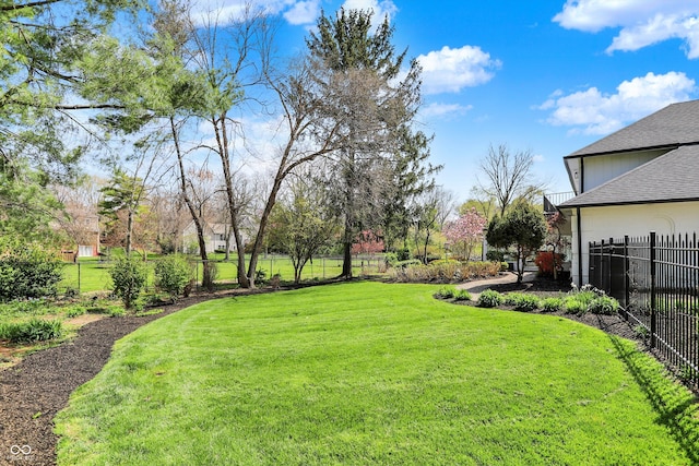 view of yard with fence