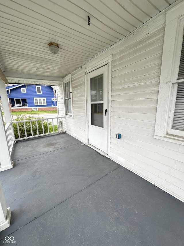 view of patio / terrace featuring a carport