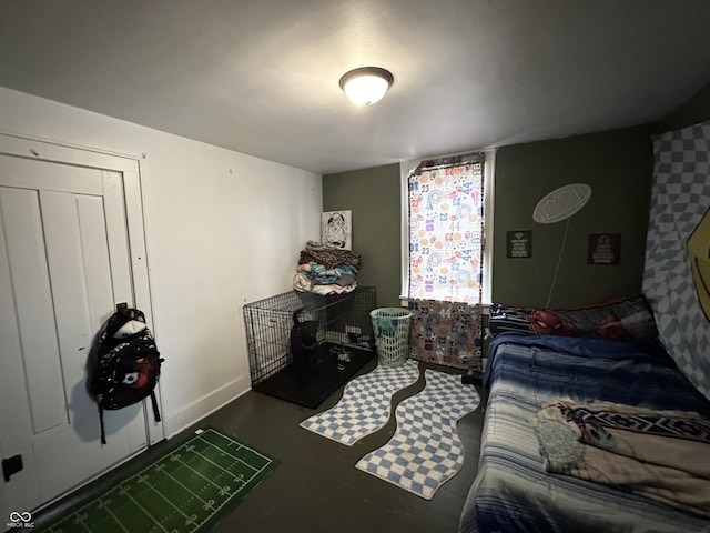 bedroom featuring baseboards