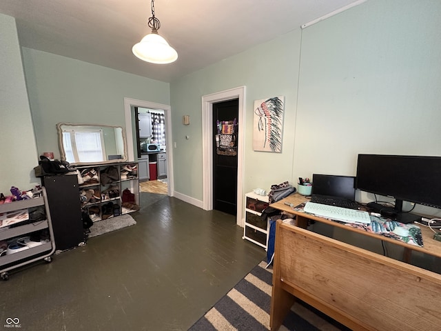 office with dark wood-type flooring
