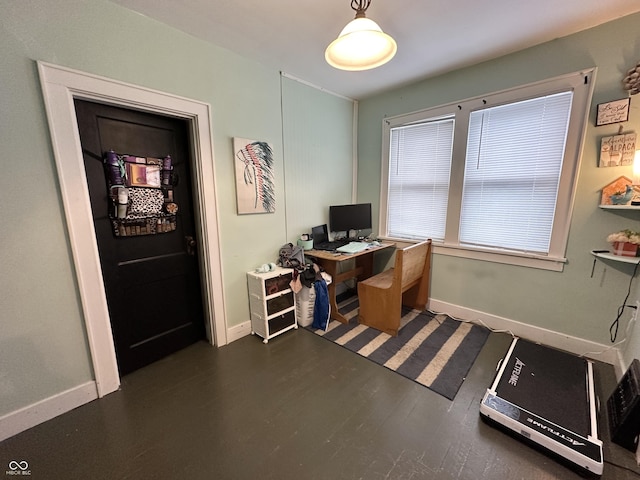 office area featuring dark wood-type flooring and baseboards