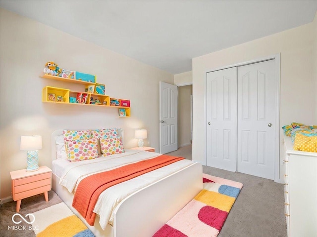 bedroom with carpet floors and a closet