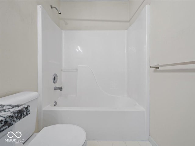 bathroom with toilet, shower / bathtub combination, and tile patterned floors