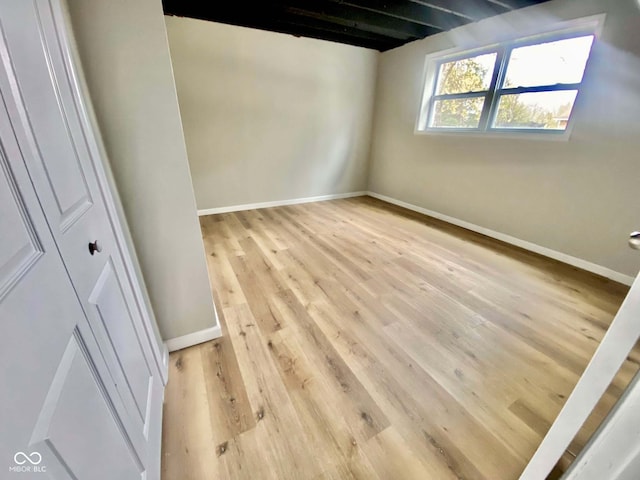 110 Renee Dr, Ellettsville, IN 47429 - unfurnished bedroom featuring light wood-style floors and baseboards
