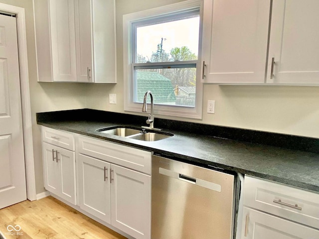 110 Renee Dr, Ellettsville, IN 47429 - kitchen featuring dishwasher, white cabinets, dark countertops, and light wood-style floors