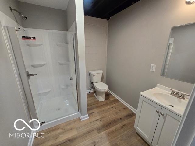 110 Renee Dr, Ellettsville, IN 47429 - bathroom with a shower stall, wood finished floors, and vanity