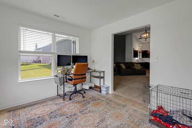 4323 Stubbington Ln, Indianapolis, IN 46239 - office featuring plenty of natural light, baseboards, and a chandelier