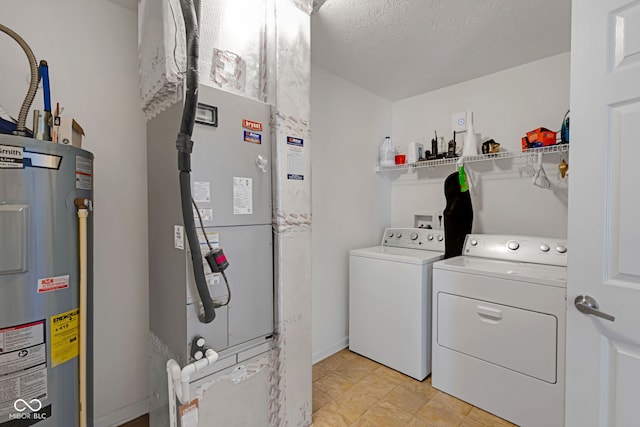 4323 Stubbington Ln, Indianapolis, IN 46239 - washroom with electric water heater, independent washer and dryer, and a textured ceiling