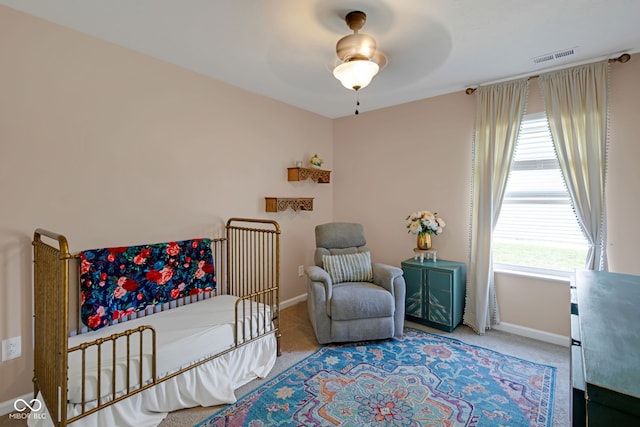 4323 Stubbington Ln, Indianapolis, IN 46239 - carpeted bedroom featuring baseboards and ceiling fan