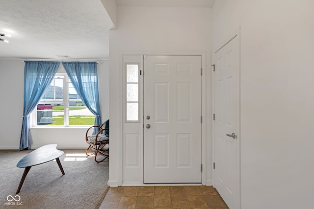 4323 Stubbington Ln, Indianapolis, IN 46239 - carpeted entrance foyer with baseboards
