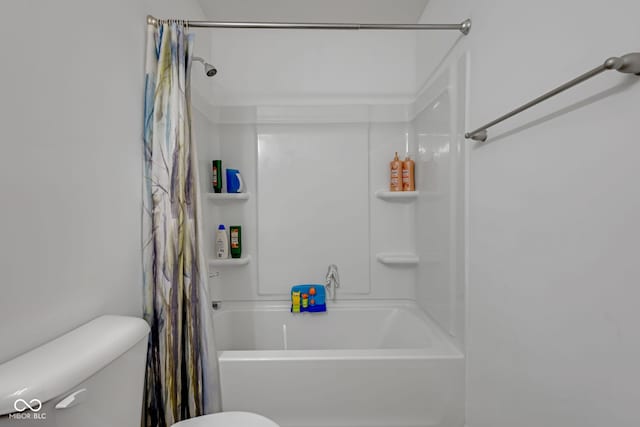 4323 Stubbington Ln, Indianapolis, IN 46239 - bathroom featuring toilet and shower / bathtub combination with curtain