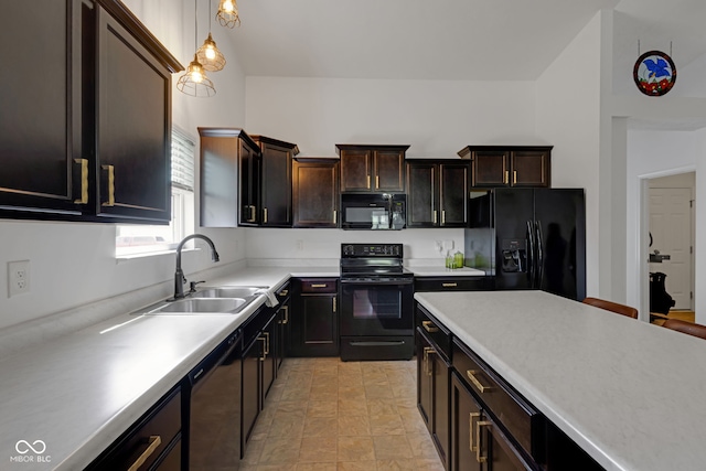 4323 Stubbington Ln, Indianapolis, IN 46239 - kitchen with black appliances, a sink, light countertops, pendant lighting, and stone finish floors