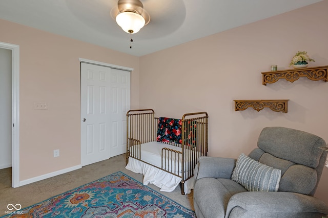 4323 Stubbington Ln, Indianapolis, IN 46239 - carpeted bedroom with a closet, baseboards, and a ceiling fan