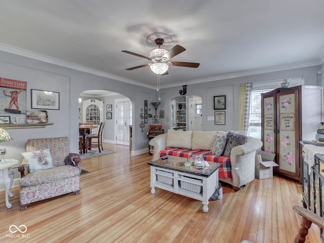 57 Worman St, Indianapolis, IN 46227 - living area with light wood-type flooring, a ceiling fan, arched walkways, and crown molding
