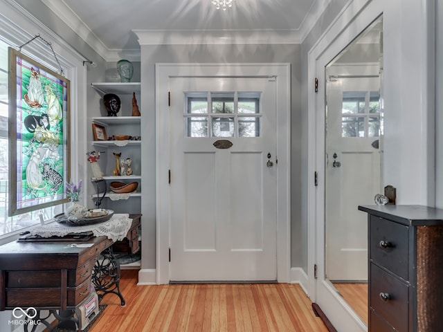 57 Worman St, Indianapolis, IN 46227 - foyer entrance featuring light wood-type flooring and ornamental molding
