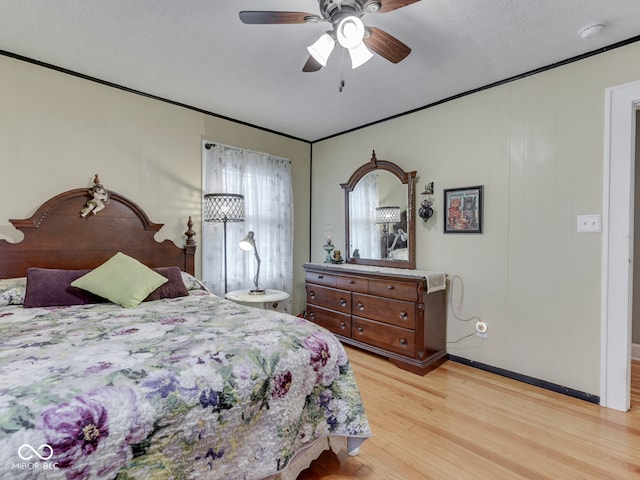 57 Worman St, Indianapolis, IN 46227 - bedroom featuring light wood-style flooring, baseboards, and ceiling fan