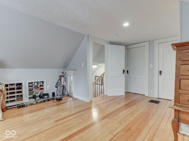 57 Worman St, Indianapolis, IN 46227 - additional living space with recessed lighting, wood finished floors, and visible vents