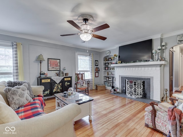 57 Worman St, Indianapolis, IN 46227 - living room with ornamental molding, a ceiling fan, and a fireplace