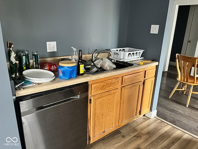 801 N Denny St, Indianapolis, IN 46201 - bar featuring stainless steel dishwasher, a sink, and dark wood finished floors