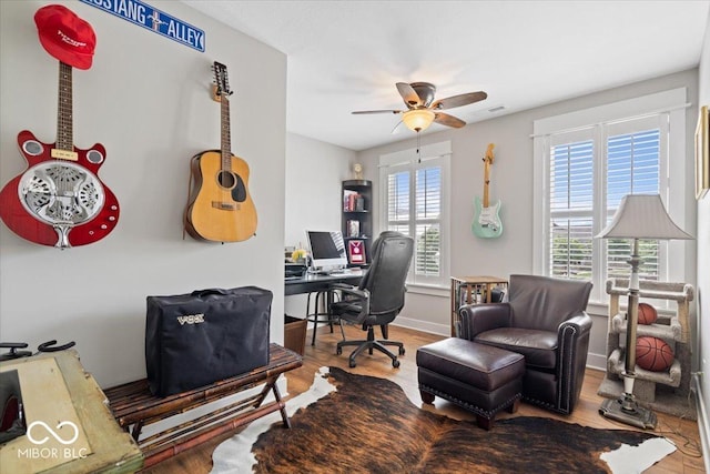 7638 Beekman Ter, Zionsville, IN 46077 - office space featuring ceiling fan, wood finished floors, and baseboards