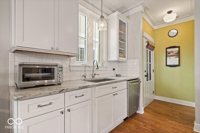 7638 Beekman Ter, Zionsville, IN 46077 - kitchen with a sink, stainless steel dishwasher, backsplash, baseboards, and white cabinets
