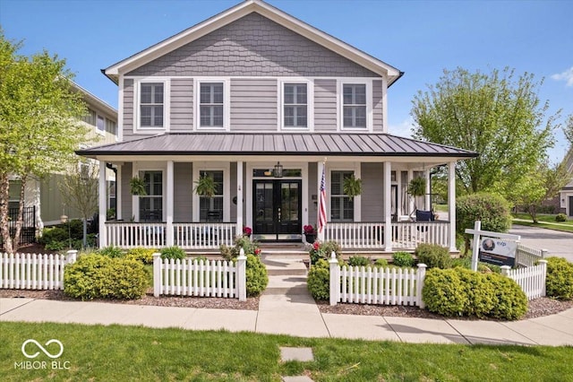 7638 Beekman Ter, Zionsville, IN 46077 - farmhouse inspired home with covered porch, a standing seam roof, and metal roof