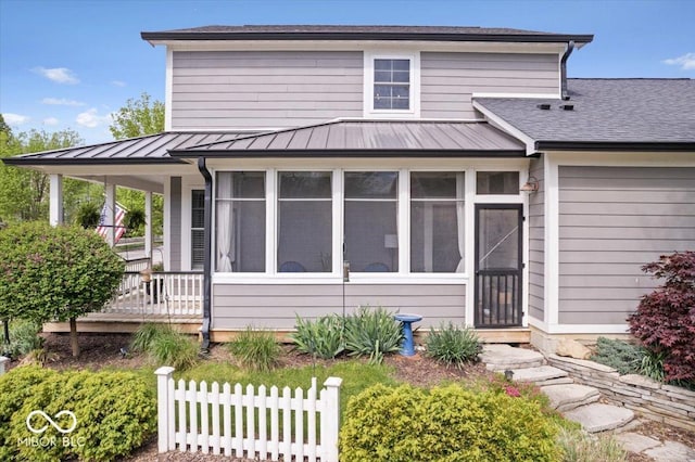 7638 Beekman Ter, Zionsville, IN 46077 - view of front of home featuring a standing seam roof, metal roof, and a sunroom