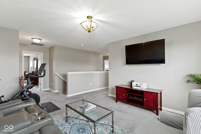 carpeted living room featuring baseboards and visible vents