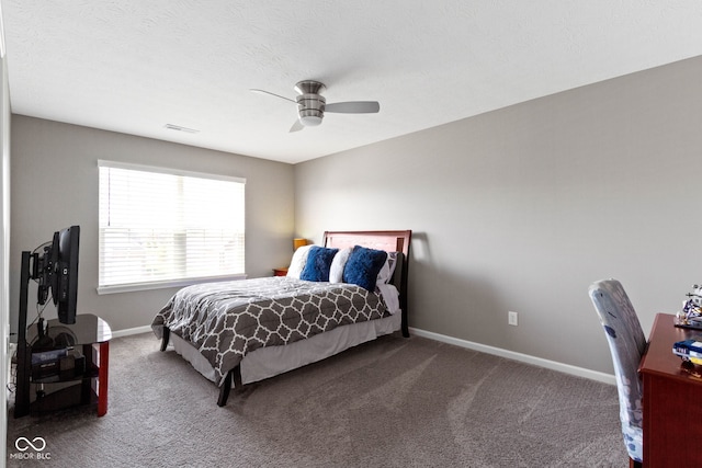 bedroom featuring carpet floors, baseboards, ceiling fan, and visible vents