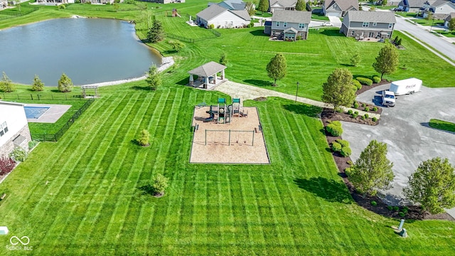 aerial view with a water view and a residential view