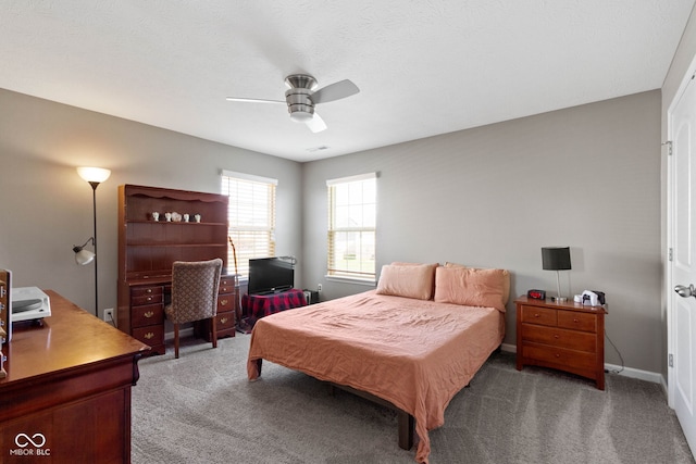 bedroom with light colored carpet and ceiling fan