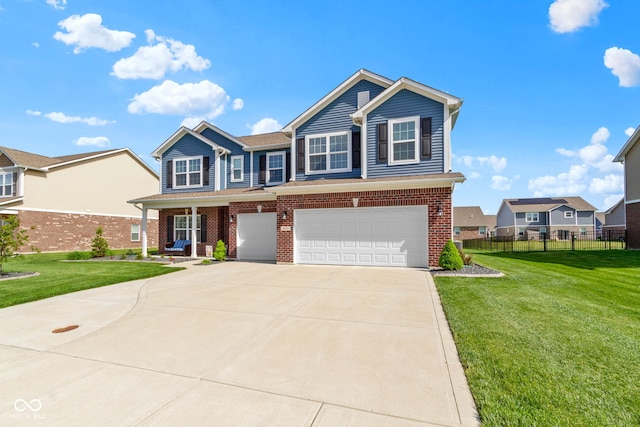craftsman-style home featuring fence, an attached garage, brick siding, a front yard, and driveway