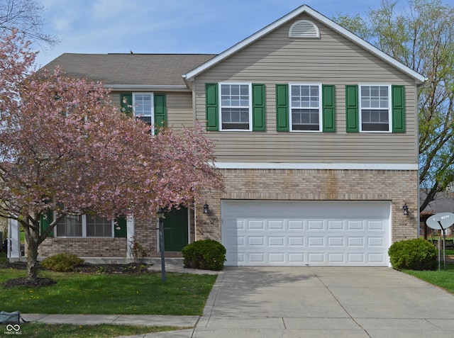 traditional-style home with an attached garage, brick siding, and driveway