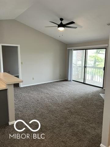 4311 Village Parkway Cir W Unit 6, Indianapolis, IN 46254 - unfurnished living room with vaulted ceiling, baseboards, carpet, and ceiling fan