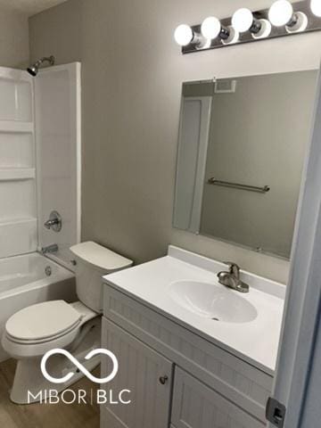 4311 Village Parkway Cir W Unit 6, Indianapolis, IN 46254 - full bath featuring shower / bath combination, toilet, and vanity