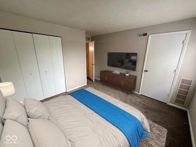 4311 Village Parkway Cir W Unit 6, Indianapolis, IN 46254 - bedroom with a closet, carpet floors, visible vents, and baseboards