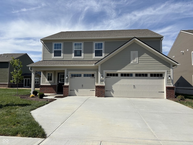 view of front of home with driveway, brick siding, a front lawn, a garage, and roof with shingles