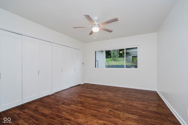 701 Hawthorn Rd, New Castle, IN 47362 - unfurnished bedroom with wood finished floors, a closet, and a ceiling fan