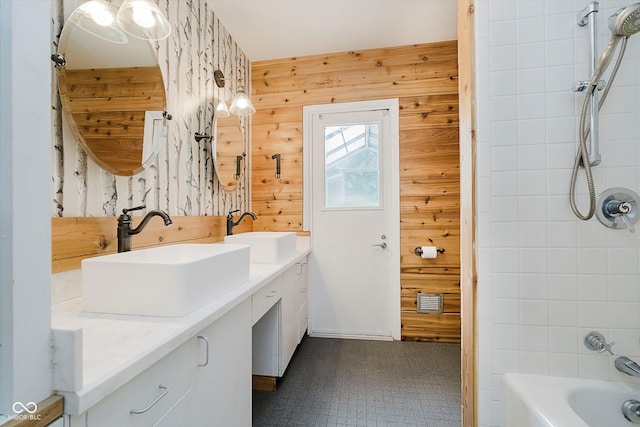 701 Hawthorn Rd, New Castle, IN 47362 - full bathroom with double vanity, bathtub / shower combination, and wooden walls