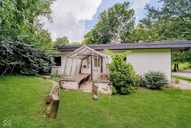 701 Hawthorn Rd, New Castle, IN 47362 - view of front of home with brick siding and a front yard